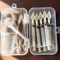 Bird medication feeding kit in a box, 10 feeding tubes, 5 syringes, 5 small spoons, 1 large spoon, measuring cup and box